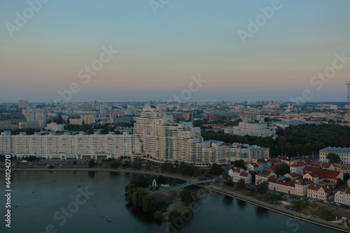 Top view of the evening city, sundown light and shadow