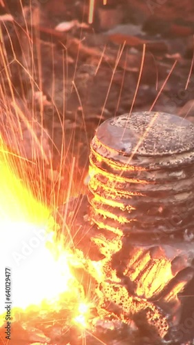 Very dirty dark smoke comes out in horrific clouds from old chimney of factory plant, polluting environment. Toxic production company. Industrial enterprise. Aerial gain attitude close up