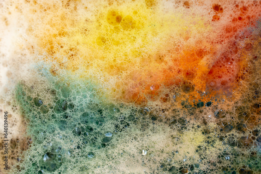 Multicolored foam rainbow bubbles, abstract soft focus close up texture