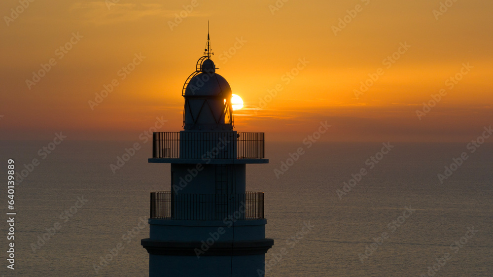 the lighthouse in the sunset