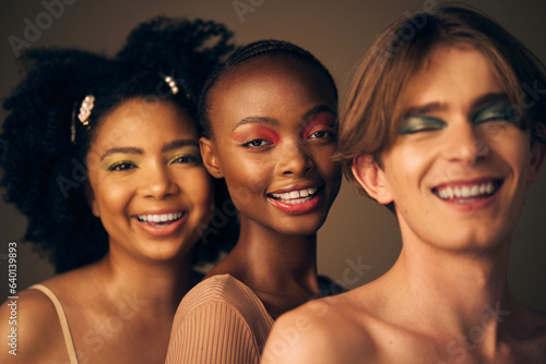 Makeup, portrait and diversity in beauty with lgbt or queer women and man in studio for creative cosmetics and fashion. Happy, face and unique style for gen z, art or model with colorful eyeshadow
