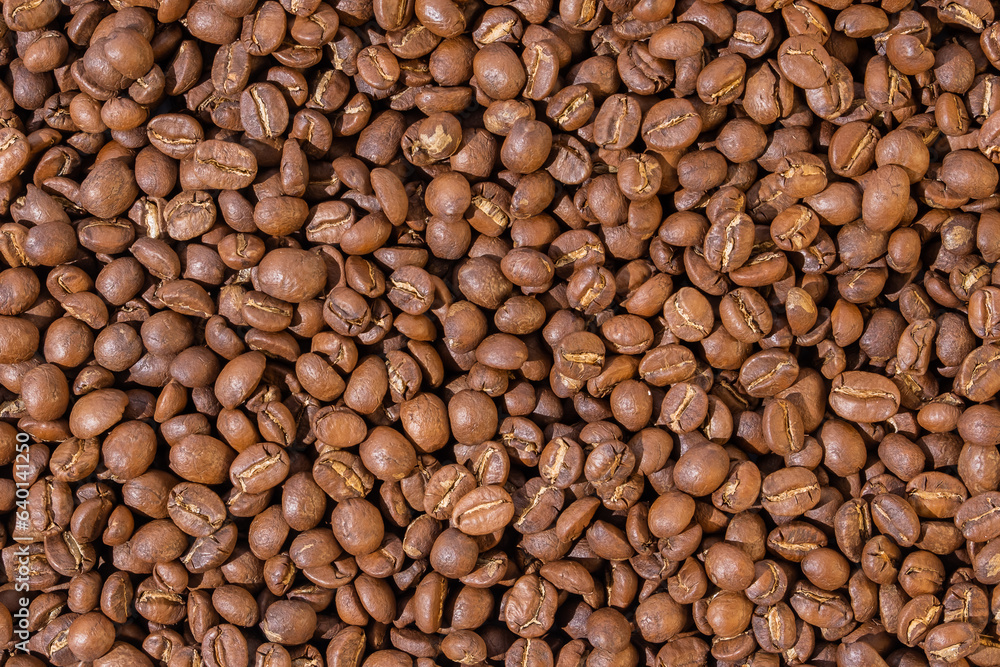 Roasted coffee beans top view wallpaper background. Roasted coffee beans top view wallpaper background.