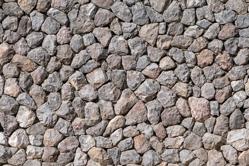 Antique stonewall texture material construction for background.