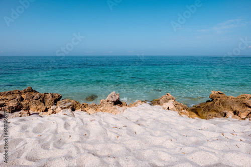 Discover Sardinia's untouched beauty in 'Is Arutas: Quartz Symphony.' This landscape photo highlights the iconic white quartz sand and crystal-clear turquoise waters. Captured in a protected area.