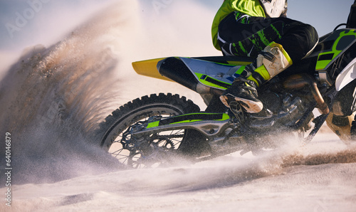 Photos Sand, desert and person on motorbike in action for race training, workout and speed challenge in sports