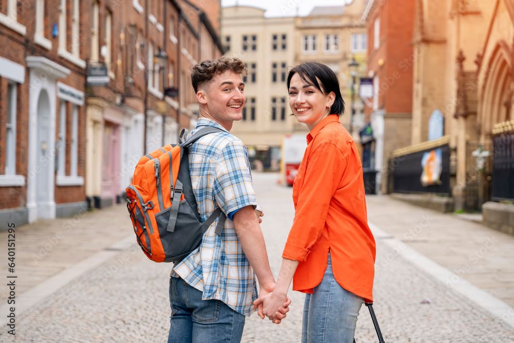 couple  having a fun time in the city of England Enjoying travel concept