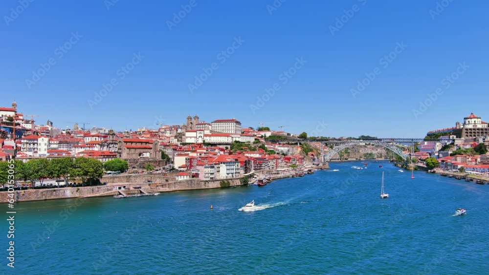 Porto, Portugal: Aerial view of famous European city, center with iconic historic Luís I Bridge (Ponte Luís I) over Douro river, Ribeira district - landscape panorama of Southern Europe from above
Porto, Portugal: Aerial view of famous European city, center with iconic historic Luís I Bridge (Ponte Luís I) over Douro river, Ribeira district - landscape panorama of Southern Europe from above