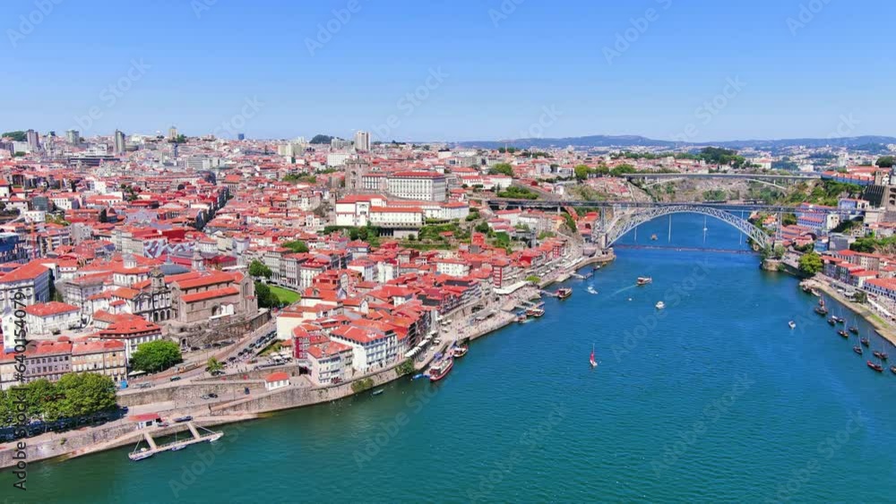 Porto, Portugal: Aerial view of famous European city, center with iconic historic Luís I Bridge (Ponte Luís I) over Douro river, Ribeira district - landscape panorama of Southern Europe from above
Porto, Portugal: Aerial view of famous European city, center with iconic historic Luís I Bridge (Ponte Luís I) over Douro river, Ribeira district - landscape panorama of Southern Europe from above