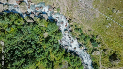 Elbrus from the north. The Sultan waterfall on the Kyzyl-Su river. Aerial view. Kabardino-Balkaria, Russia