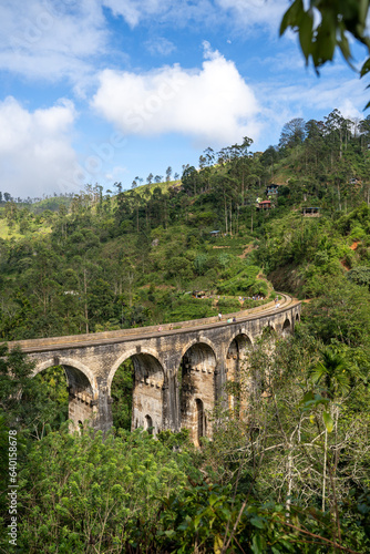 Famous Nine Arch Bridge on a sunny day in Ella, train journey Sri Lanka
