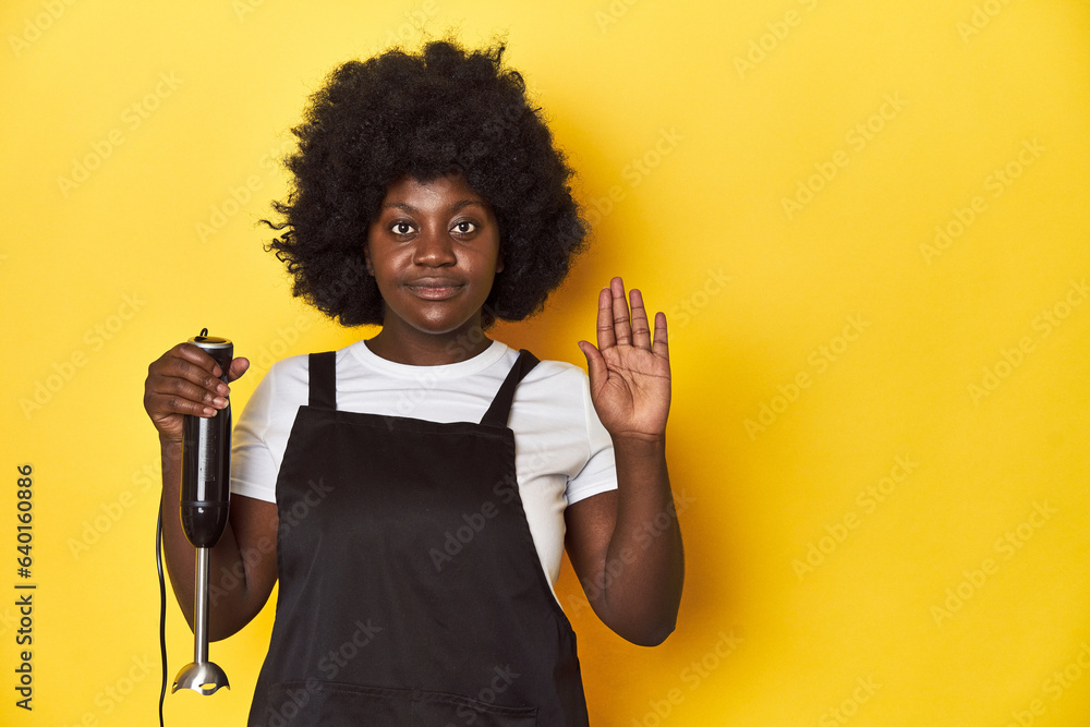Home-baking woman with mixer, ready to create smiling cheerful showing number five with fingers. Home-baking woman with mixer, ready to create smiling cheerful showing number five with fingers.