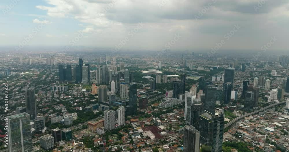 Jakarta business district in Indonesia capital city with many modern skyscrapers. Indonesia. Jakarta business district in Indonesia capital city with many modern skyscrapers. Indonesia.