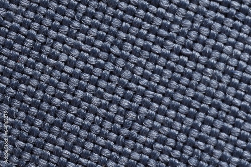 Macro photo of blue textured fabric as background