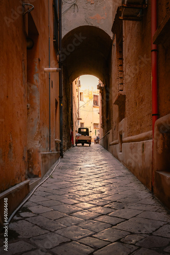 Alley in Old Taranto with typical Italian vehicle parked