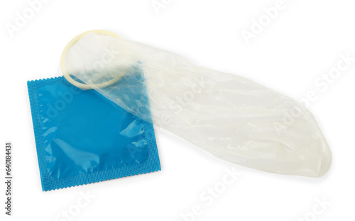 Unrolled condom and package on white background, top view. Safe sex