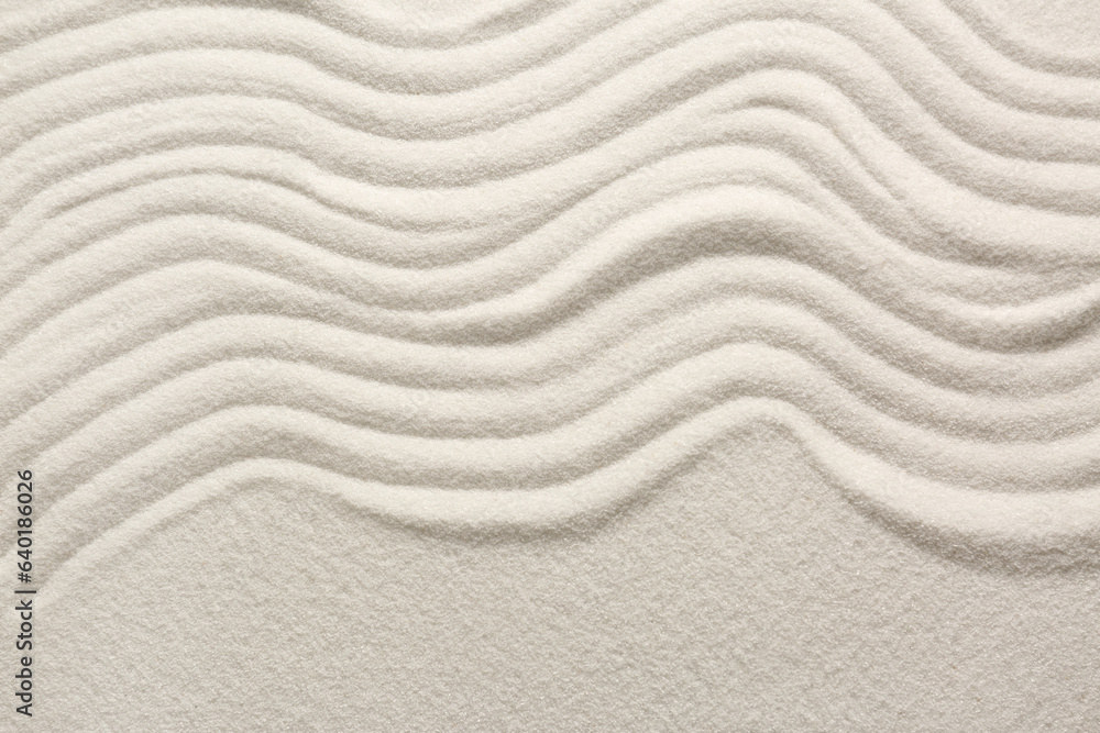 White sand with pattern as background, top view. Zen concept White sand with pattern as background, top view. Zen concept