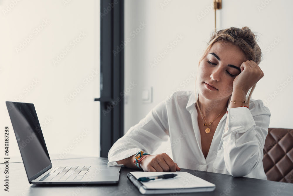 Stressed tired woman in pain having strong terrible headache attack after computer laptop study, fatigued exhausted girl suffering from chronic migraine massaging temples to relieve head ache tension. Stressed tired woman in pain having strong terrible headache attack after computer laptop study, fatigued exhausted girl suffering from chronic migraine massaging temples to relieve head ache tension.