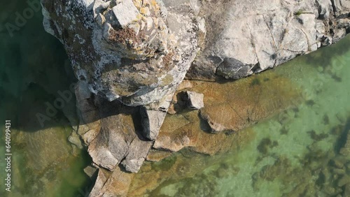 Topdown View Of Massive Rock Cliffs On The Coast Near Aldan In Galicia, Spain. Aerial Shot photo