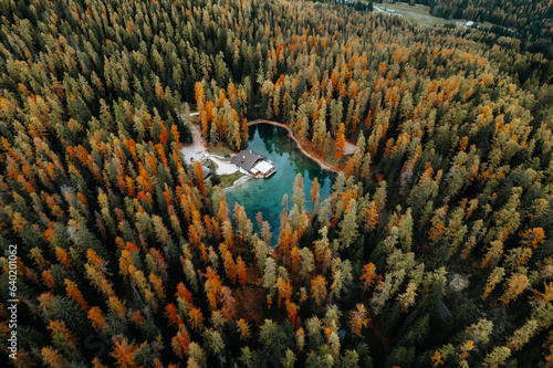 Aerial autumn view of lake Lago Ghedina, The Dolomites South Tyrol Italy photo