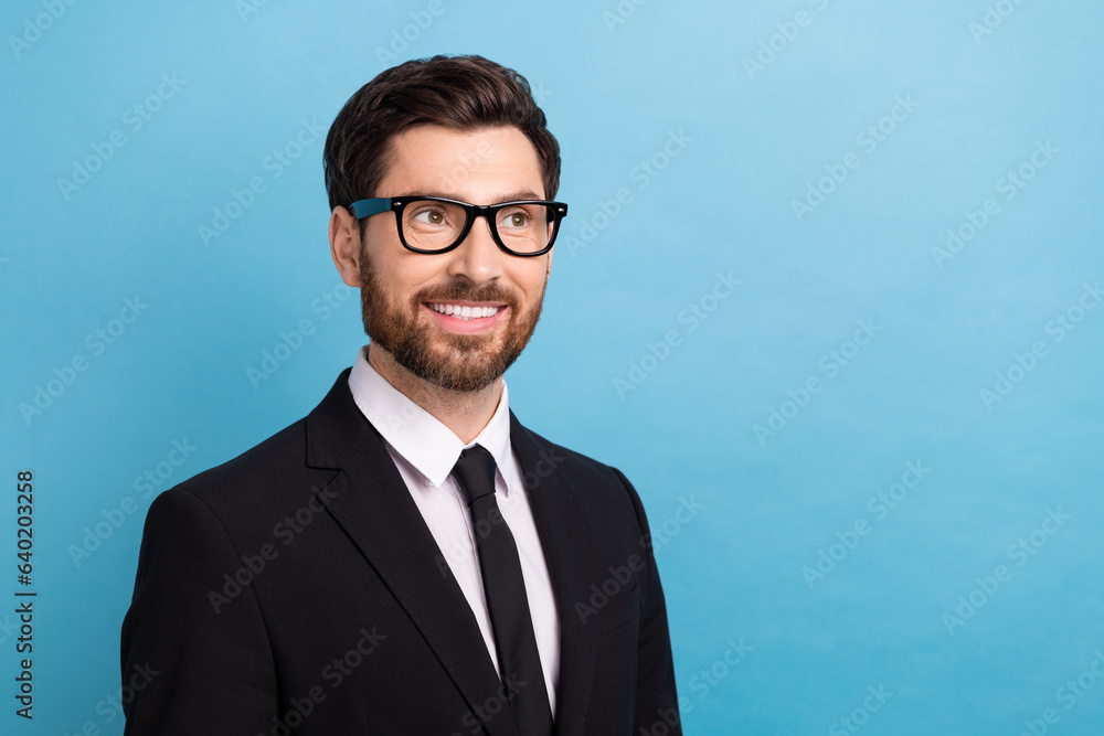 Photo of young guy classic necktie formal style outfit new glasses looking empty space expert feedback isolated on blue color background