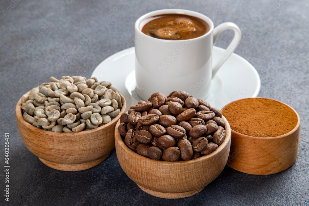 A cup of Turkish coffee with roasted coffee, green coffee, ground coffee A cup of Turkish coffee with roasted coffee, green coffee, ground coffee