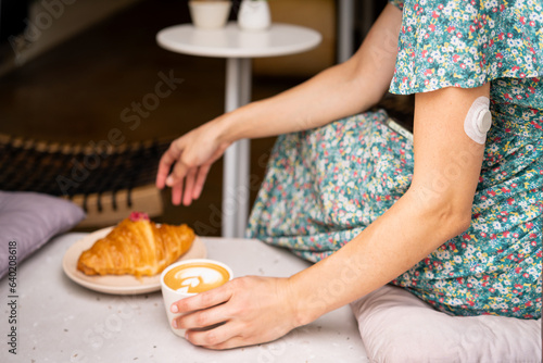 Diabetic woman ready to drink coffee. Delicious French breakfast with food and drink