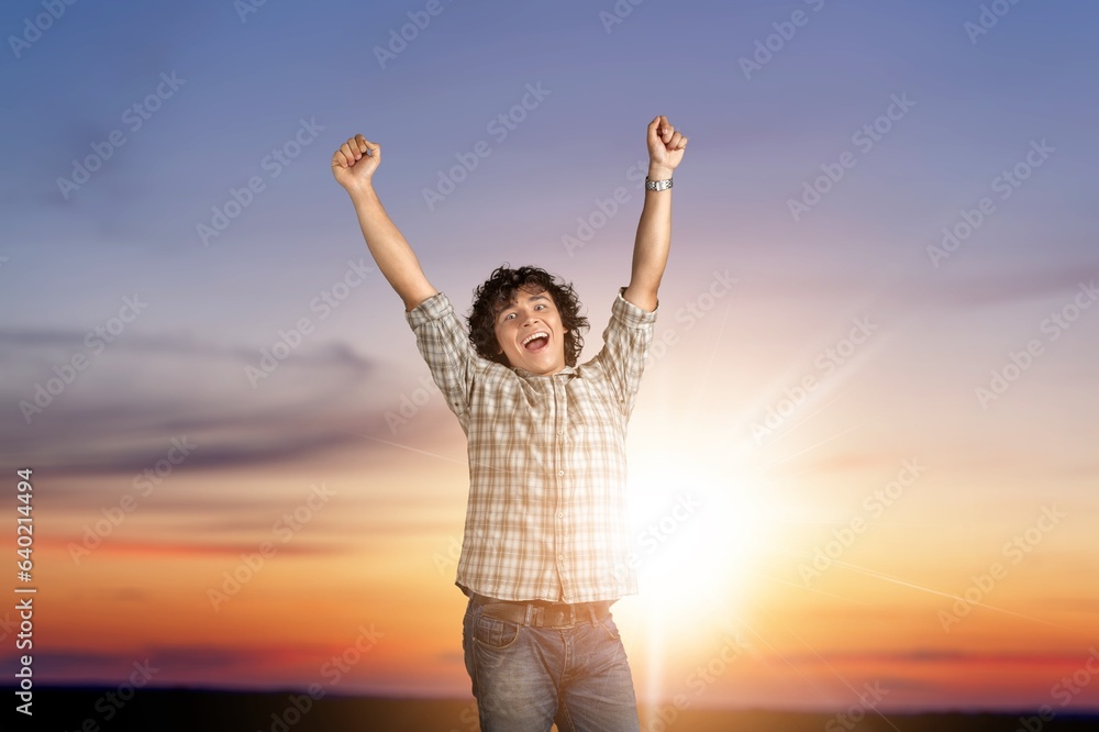 Man feeling happy and free in nature background Man feeling happy and free in nature background