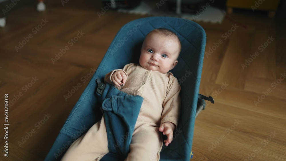 newborn baby in a rocking chair. happy family kid dream concept ...