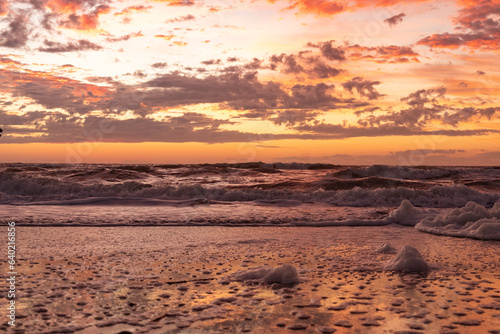 Fototapeta Naklejka Na Ścianę i Meble -  Golden hour sunrise on the Beach at Pawley's Island, South Carolina, USA
