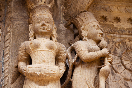 Carving details on the inner wall of Ahilya Devi Fort complex on the banks of River Narmada, Maheshwar, Madhya Pradesh, India photo