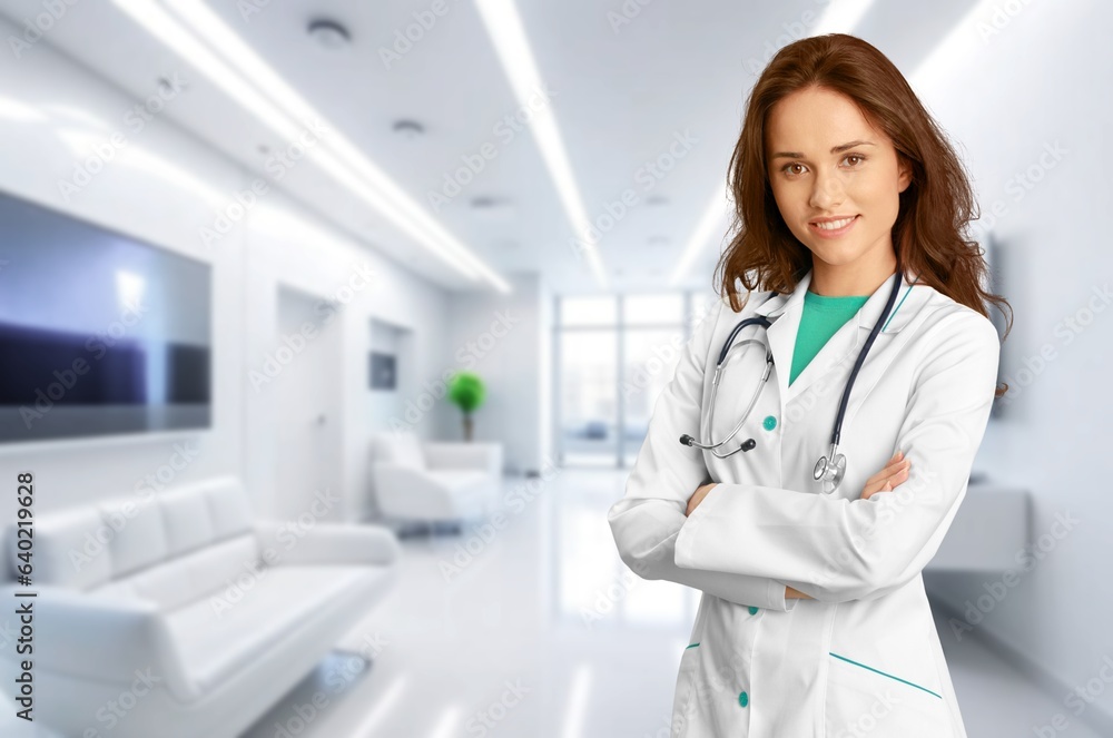 Happy young female doctor posing. Healthcare concept Happy young female doctor posing. Healthcare concept