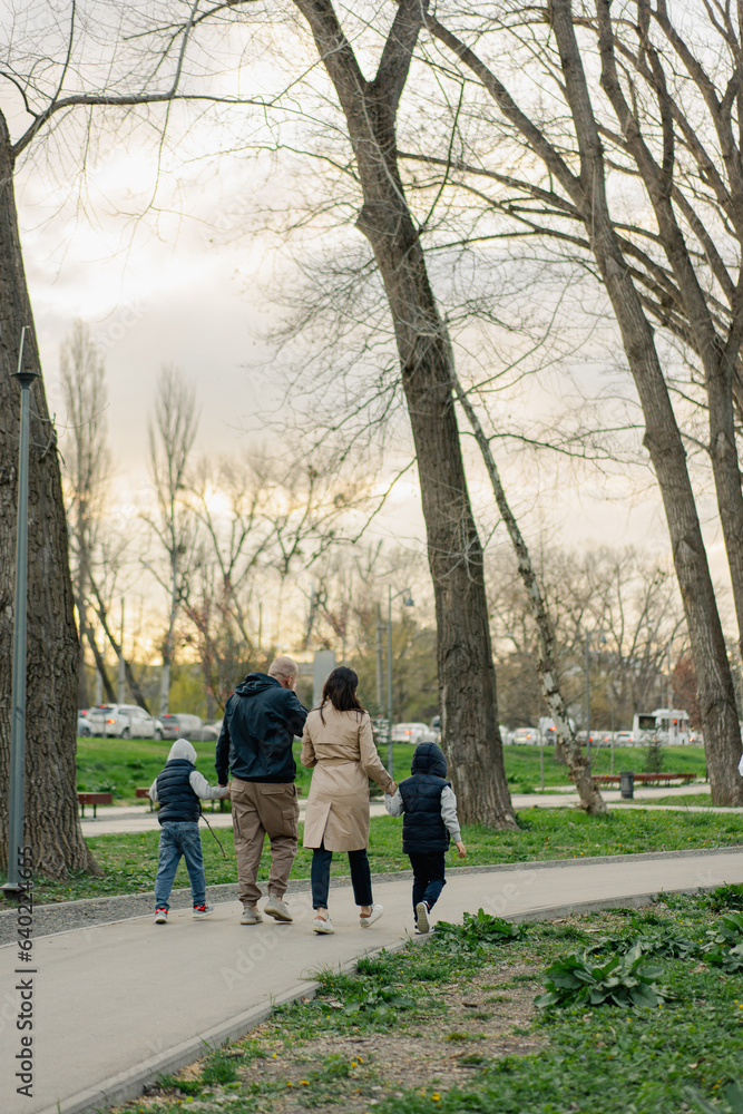 Happy family on a walk in the park