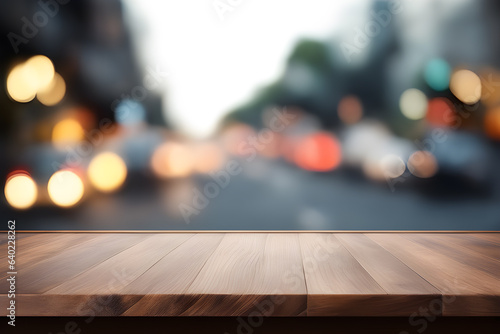 Blurred image of a shopping mall with wooden tables placed to display your products.