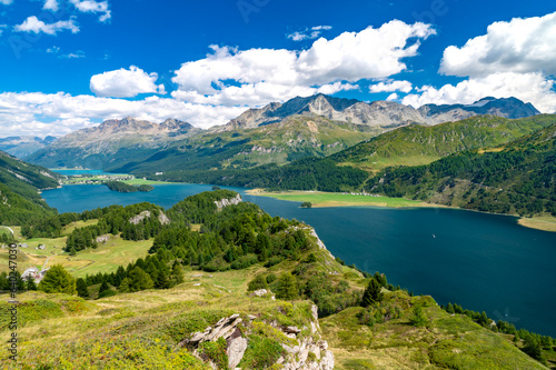 A view of Lake Sils and the Engadine from above. Panorama from Maloja and Grevasalvas 