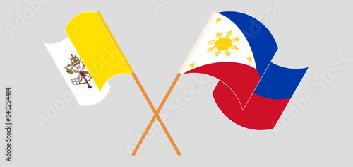 Crossed and waving flags of Vatican and the Philippines