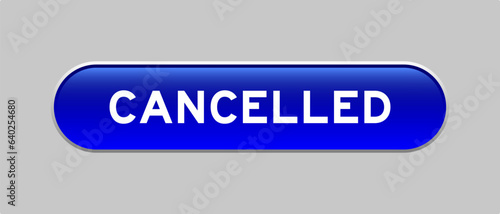 Blue color capsule shape button with word cancelled on gray background