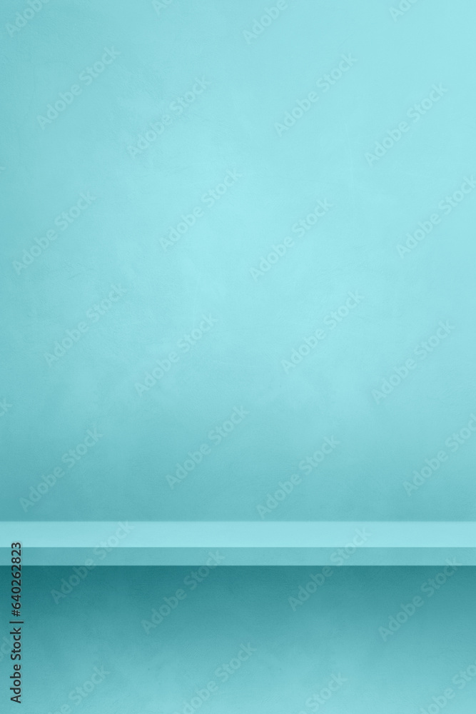 Empty shelf on an aqua blue concrete wall. Background template. Vertical mockup