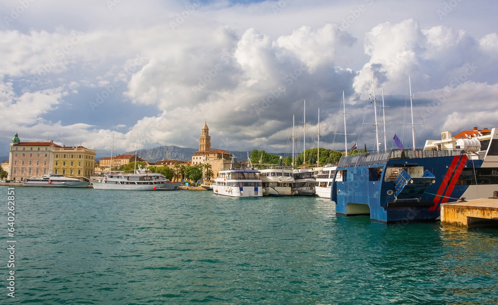 The waterfront of the historic coastal city of Split in Dalmatia, Croatia. The Cathedral of Saint Domnius bell tower is centre and the Harbour Master's Office far left