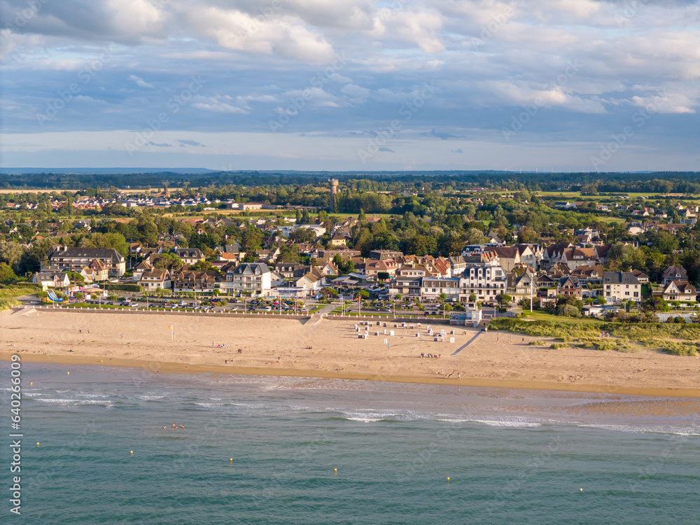 Aerial view of the coastline and beach in Caen, France.