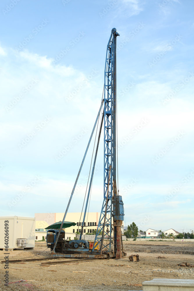 Pile driving crane on construction site Pile driving crane on construction site