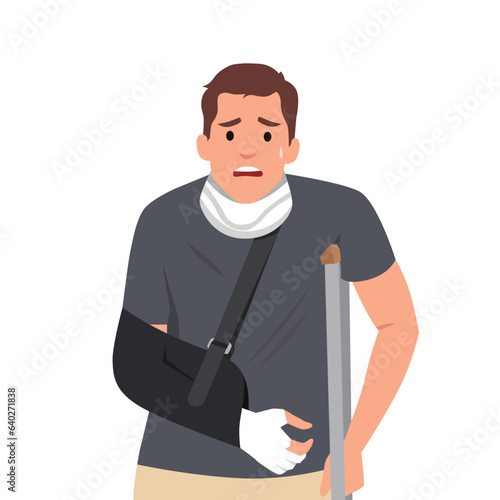 Sad and happy man with a broken arm and leg in a cast with a crutch and a fixing collar around his neck. Fracture limb. Injury.