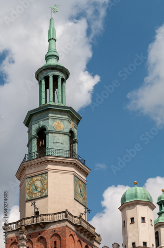 Tower of Poznan Town Hall with clock and bell