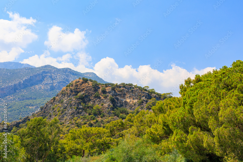 Beautiful view of the green mountains from the popular Oludeniz beach in Turkey