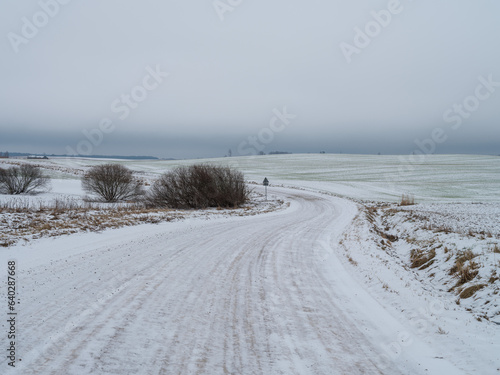 Fototapeta Naklejka Na Ścianę i Meble -  Landscape with winter road covered in ice