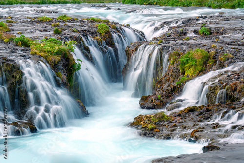 Fototapeta Naklejka Na Ścianę i Meble -  Bruarfoss waterfall flowing from Bruara river in summer at Iceland