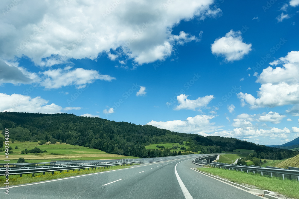 Asphalt highway with beautiful scenery. Road in nature landscape background.