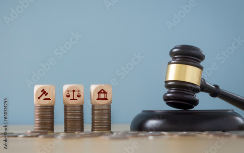 Justice icons on coins and cubes Law office concept, judge's hammer, justice scale