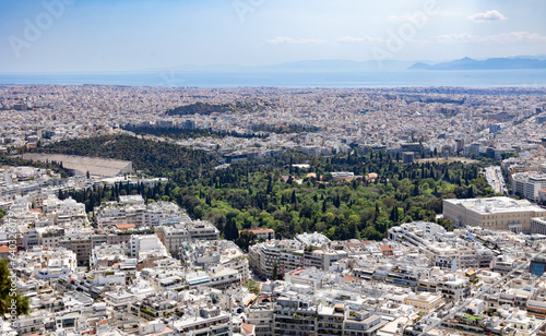 Athens buildings' rooftops from Saint George Chapel of Likavittos view point capturing Panathenaic Stadium partially