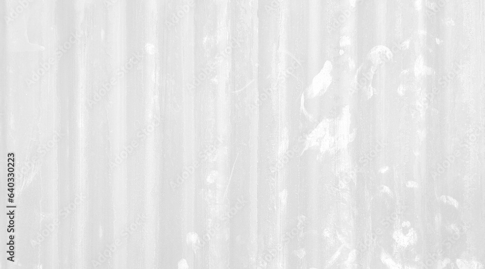 old white galvanized corrugated metal sheet wall with rust used as background in close up view. grey rusty iron metal construction site wall. old white galvanized corrugated metal sheet wall with rust used as background in close up view. grey rusty iron metal construction site wall.