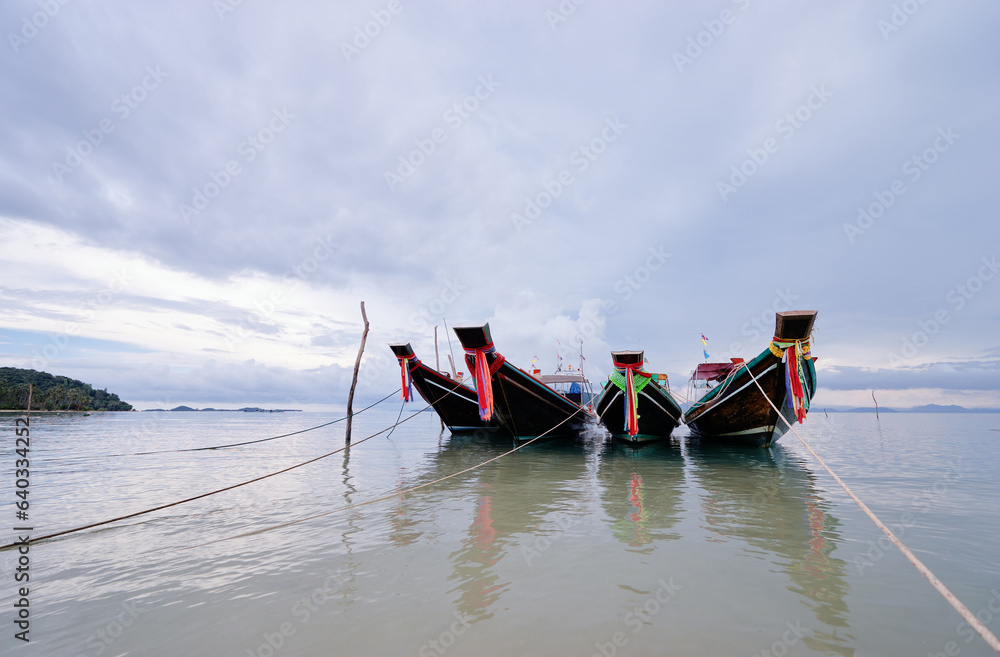 Beautiful landscape with traditional longtail boat on the beach. Samui, Thailand.